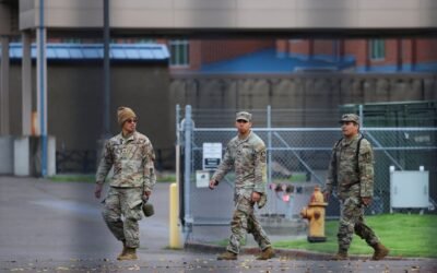 PHOTO: Members of the 49th California Military Police Brigade walk the grounds at the Oregon Army National Guard's Camp Withycombe in Happy Valley, Oregon, Oct. 22, 2025.
