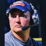 Missing Virginia football coach wanted on child sex abuse charges walked into woods with gun, family says