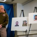 PHOTO: Brigadier General Leland D. Blanchard II looks at photos of two National Guard members who were shot along with a photo of a suspect, Afghan national Rahmanullah Lakanwal, at a news conference in Washington, DC, Nov. 27, 2025.
